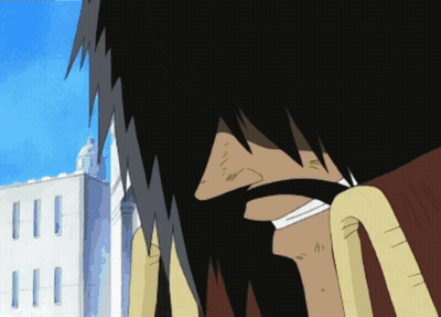 A Close Up Of A Person 'S Face In Front Of A White Building GIF