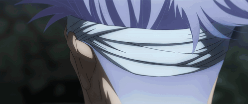 A Close Up Of A Person 'S Face With A Bandage Around It GIF