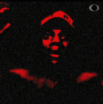 A Close Up Of A Person 'S Face With A Black Background And Red Lips GIF