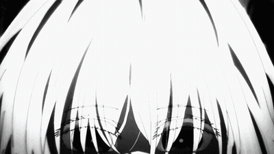 A Close Up Of A Person 'S Face With A Black Background GIF
