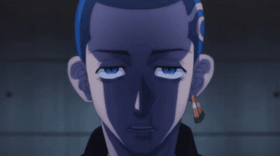 A Close Up Of A Person 'S Face With A Blue Haircut GIF