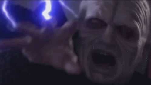 A Close Up Of A Person 'S Face With A Blue Lightning Bolt Coming Out Of It . GIF