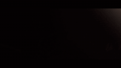 A Close Up Of A Person 'S Face With A Blurred Background . GIF