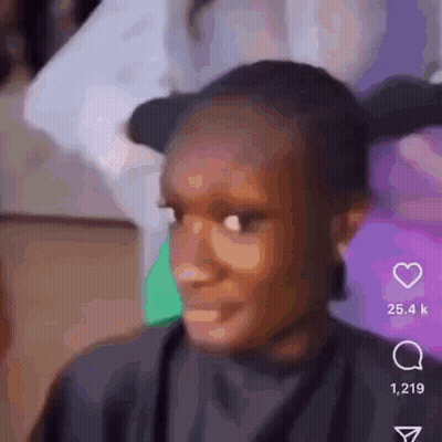 A Close Up Of A Person 'S Face With A Blurred Background . GIF