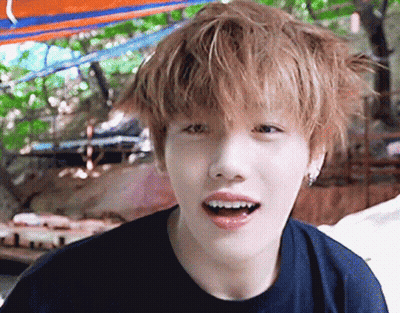 A Close Up Of A Person 'S Face With A Blurred Background GIF