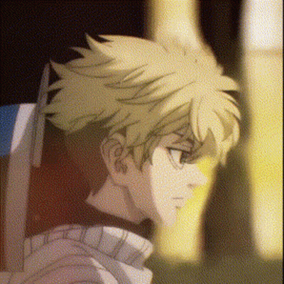 A Close Up Of A Person 'S Face With A Blurry Background And A Yellow Haired Anime Character . GIF