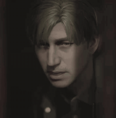 A Close Up Of A Person 'S Face With A Dark Background GIF