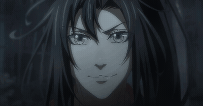 A Close Up Of A Person 'S Face With A Dark Background GIF