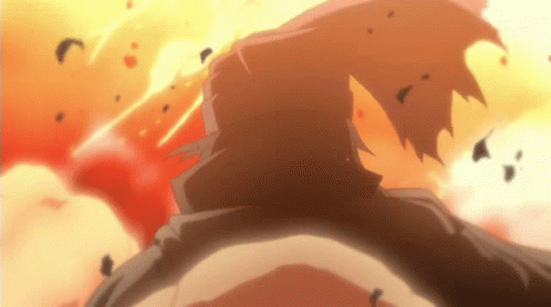 A Close Up Of A Person 'S Face With A Explosion Behind Them GIF