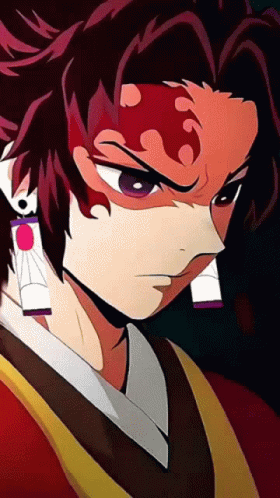 A Close Up Of A Person 'S Face With A Few Earrings GIF