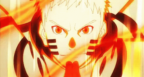 A Close Up Of A Person 'S Face With A Fire Coming Out Of It . GIF