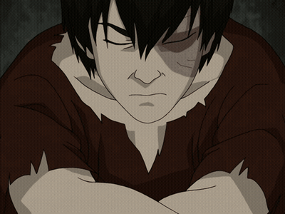 A Close Up Of A Person 'S Face With A Fire Coming Out Of Their Mouth GIF