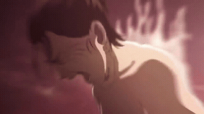 A Close Up Of A Person 'S Face With A Flame Behind It . GIF