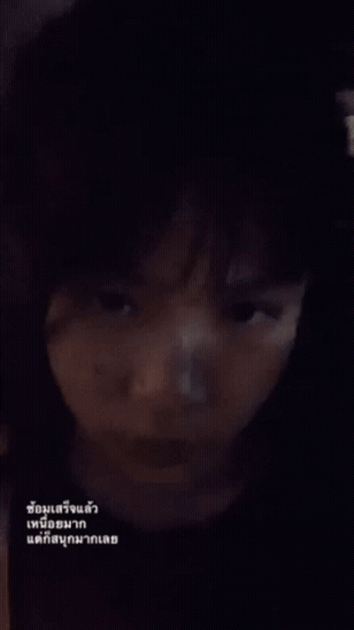A Close Up Of A Person 'S Face With A Foreign Language Written On It GIF