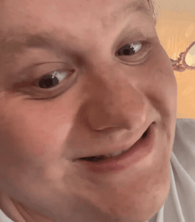 A Close Up Of A Person 'S Face With A Funny Face GIF