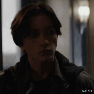 A Close Up Of A Person 'S Face With A Gifs Art Watermark GIF