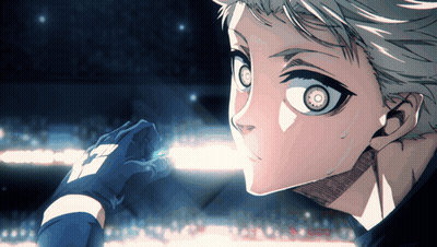 A Close Up Of A Person 'S Face With A Glove That Has The Letter T On It GIF