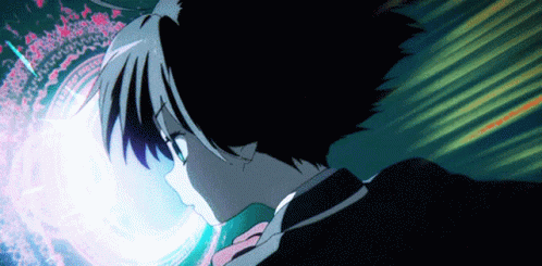 A Close Up Of A Person 'S Face With A Glowing Object Coming Out Of It . GIF