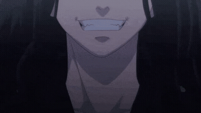 A Close Up Of A Person 'S Face With A Heart Shaped Mouth GIF