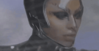 A Close Up Of A Person 'S Face With A Helmet On . GIF