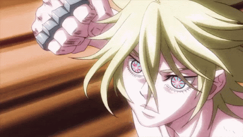 A Close Up Of A Person 'S Face With A Knuckle Duster GIF