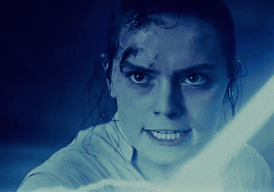 A Close Up Of A Person 'S Face With A Light Behind Them GIF