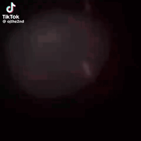 A Close Up Of A Person 'S Face With A Lightning Bolt Coming From It . GIF