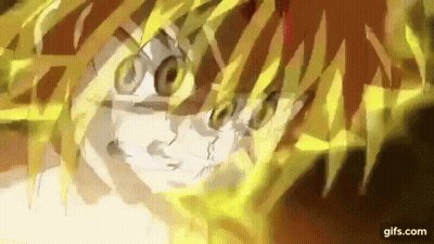 A Close Up Of A Person 'S Face With A Lot Of Yellow Glowing Lines Coming Out Of It . GIF