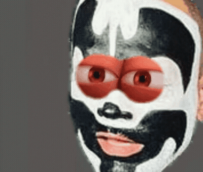 A Close Up Of A Person 'S Face With A Mask On GIF