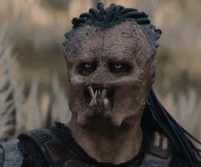 A Close Up Of A Person 'S Face With A Mask On GIF