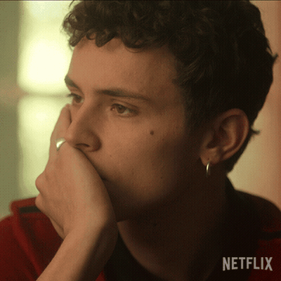 A Close Up Of A Person 'S Face With A Netflix Logo In The Corner GIF