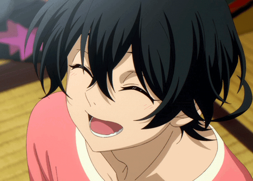 A Close Up Of A Person 'S Face With A Pink Shirt On GIF