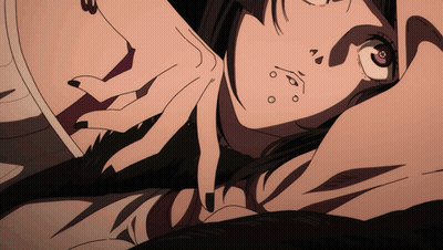 A Close Up Of A Person 'S Face With A Purple Eye And The Number 3 On It GIF