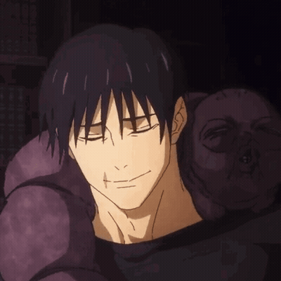 A Close Up Of A Person 'S Face With A Purple Pillow In The Background GIF