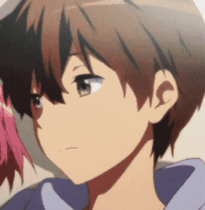 A Close Up Of A Person 'S Face With A Purple Shirt On GIF