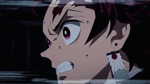 A Close Up Of A Person 'S Face With A Red Eye GIF