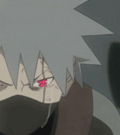 A Close Up Of A Person 'S Face With A Red Eye GIF