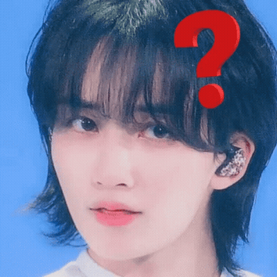 A Close Up Of A Person 'S Face With A Red Question Mark On It . GIF