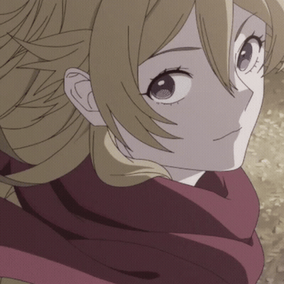 A Close Up Of A Person 'S Face With A Red Scarf Around Their Neck GIF