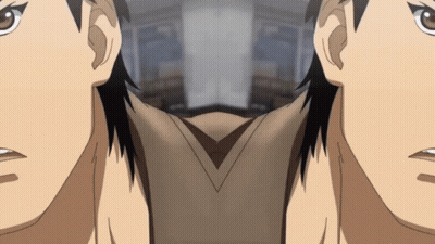 A Close Up Of A Person 'S Face With A Reflection Of Another Person GIF