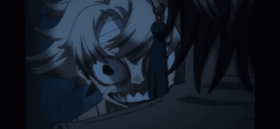 A Close Up Of A Person 'S Face With A Scary Expression GIF