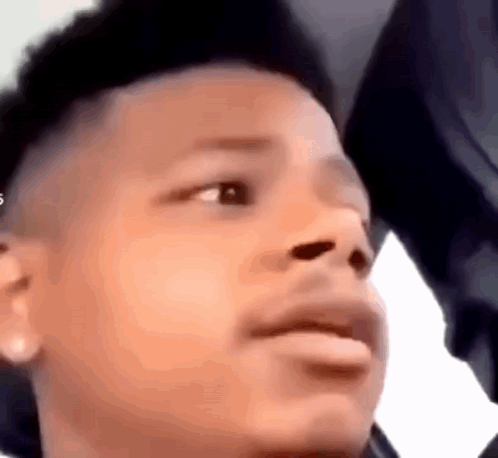 A Close Up Of A Person 'S Face With A Serious Look On His Face . GIF