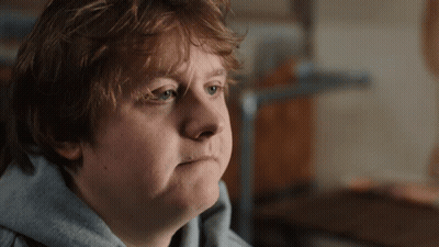 A Close Up Of A Person 'S Face With A Serious Look On Their Face GIF