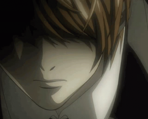 A Close Up Of A Person 'S Face With A Shadow On It GIF