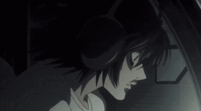 A Close Up Of A Person 'S Face With A Shadow On Their Face GIF