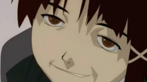 A Close Up Of A Person 'S Face With A Slight Smile On Their Face GIF