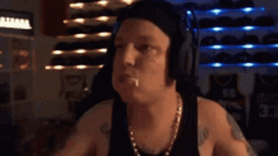 A Close Up Of A Person 'S Face With A Slight Smirk On It . GIF