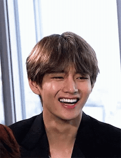 A Close Up Of A Person 'S Face With A Smile On It GIF