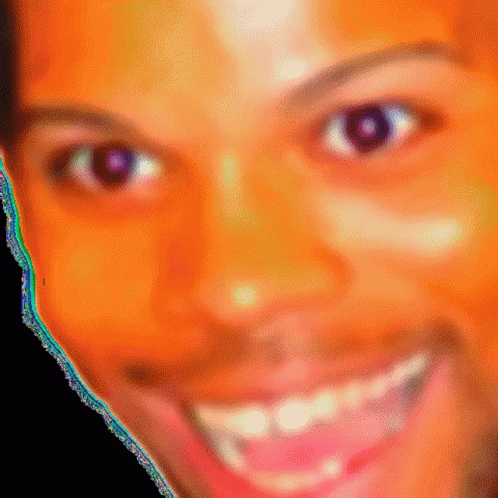 A Close Up Of A Person 'S Face With A Smile On It GIF