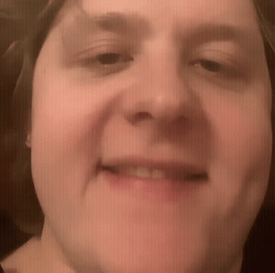 A Close Up Of A Person 'S Face With A Smile On It GIF